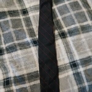 Classic Black Tie with Subtle Red Accents